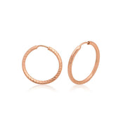 Petites boucles d'oreilles créoles torsadées en argent rose